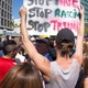 A protester holds an anti-Donald Trump sign reading, “Stop Hate, Stop Racism, Stop Trump,” amid a huge crowd of protesters outside a Trump rally at the San Diego Convention Center on May 27, 2016.
iStock